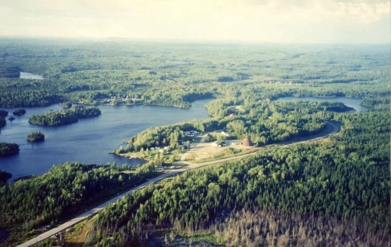 Bay Wolf Camp buildings beside West Shining Tree Lake