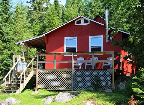 Red waterfront cabin at Northern Walleye Lodge